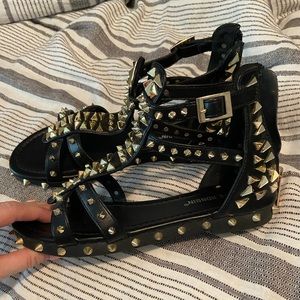 Black and gold gladiator sandals